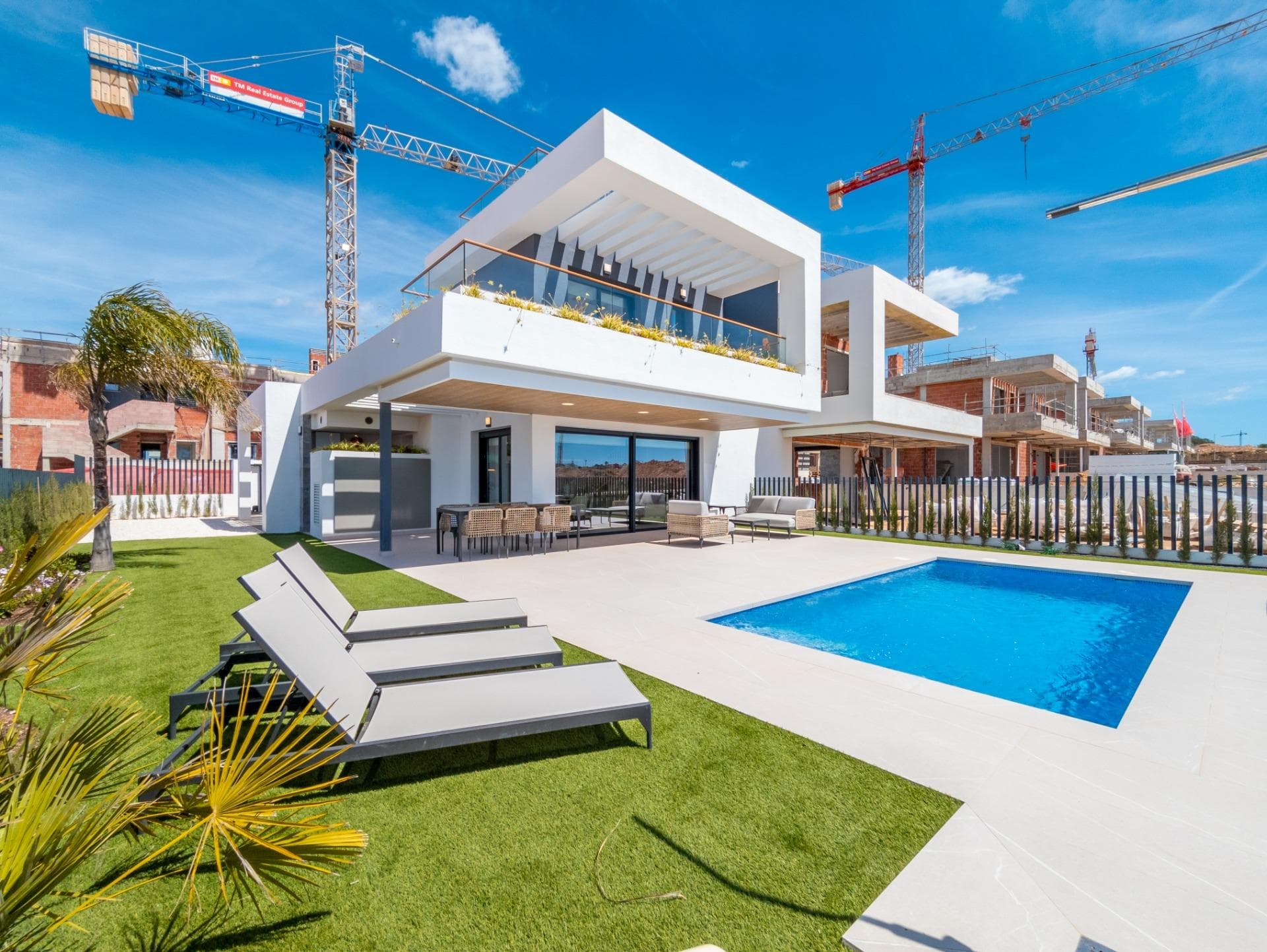 Luxury villa in a gated community with swimming pools and green areas