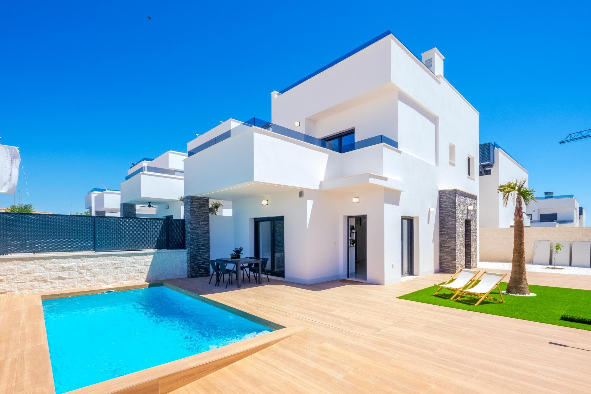 Luxury villa with a private garden, swimming pool and solarium, close to golf courses.